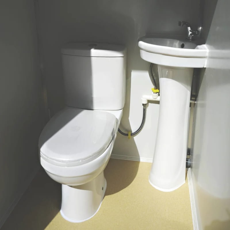 Bastone Portable Restroom with Two Private Stalls